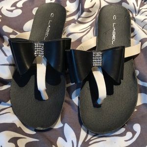 L•A•D•E•L sandals